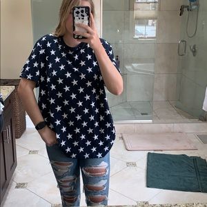 Never worn!! Star patterned T-Shirt size XL